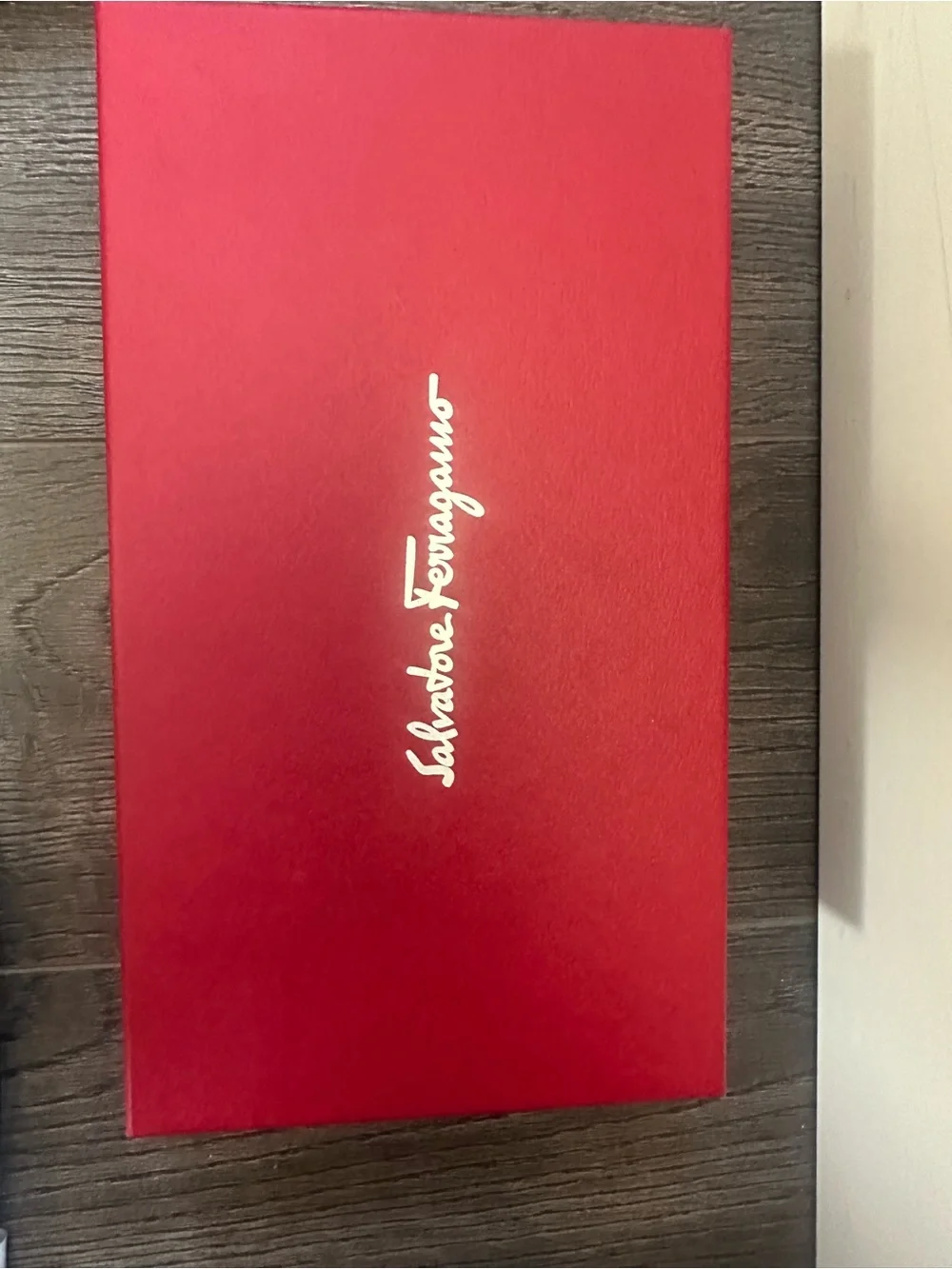 Salvatore Ferragamo Black Leather Zip Phone Wallet with Gold Logo Plaque